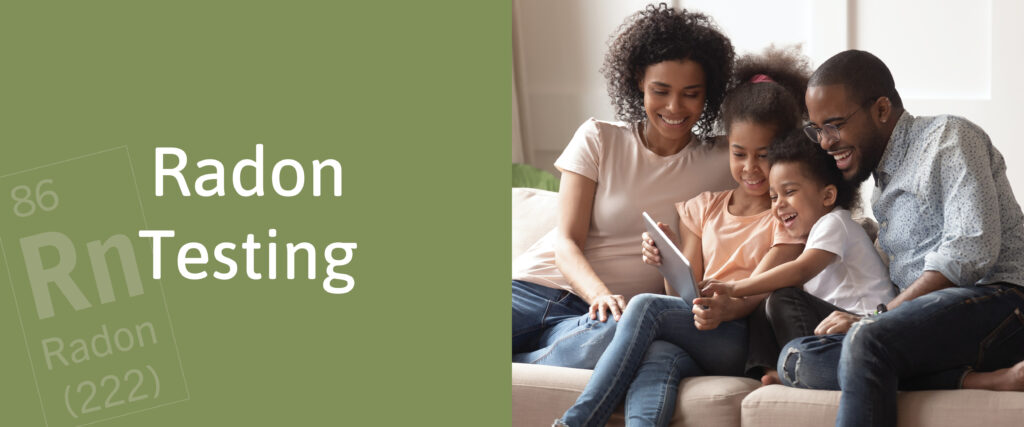 Parents with two young children on couch laughing and enjoying family-time together after Radon Inspection  